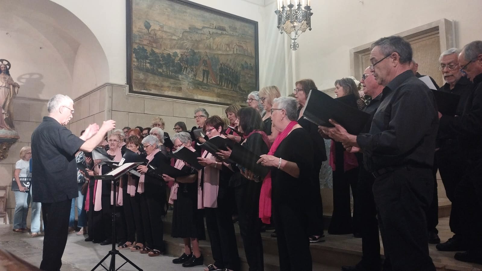Les tres corals interpretaren "L'Estaca"