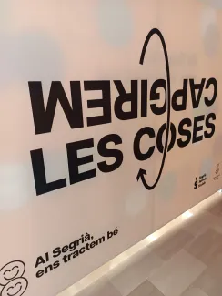 Un dels lemes de campanya, "Capgirem les coses"