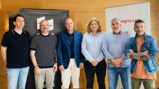 Xavier Esterri, tècnic de la Casa de la Música; Òscar Enrech, director gerent de la Fundació Orfeó Lleidatà i director de la Casa de la Música de Lleida, l’Alt Pirineu i Aran; Antoni Soliva, president de la Fundació Orfeó Lleidatà; David Masot, president del Consell Comarcal del Segrià; Àlvaro Boqué, cap de l'àrea de Joventut i Cultura del Consell; i David Lesan, referent comarcal de joventut al Segrià.
