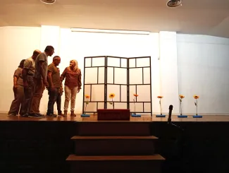 Lo Niu en escena